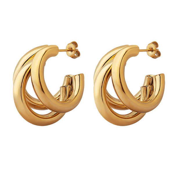 These three layer c-shape round tube earrings are the perfect addition to your jewelry collection. These are a staple item that elevates any outfit. Comes in a gold and silver style. 