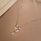 Dazzling Dove Wreath Necklace