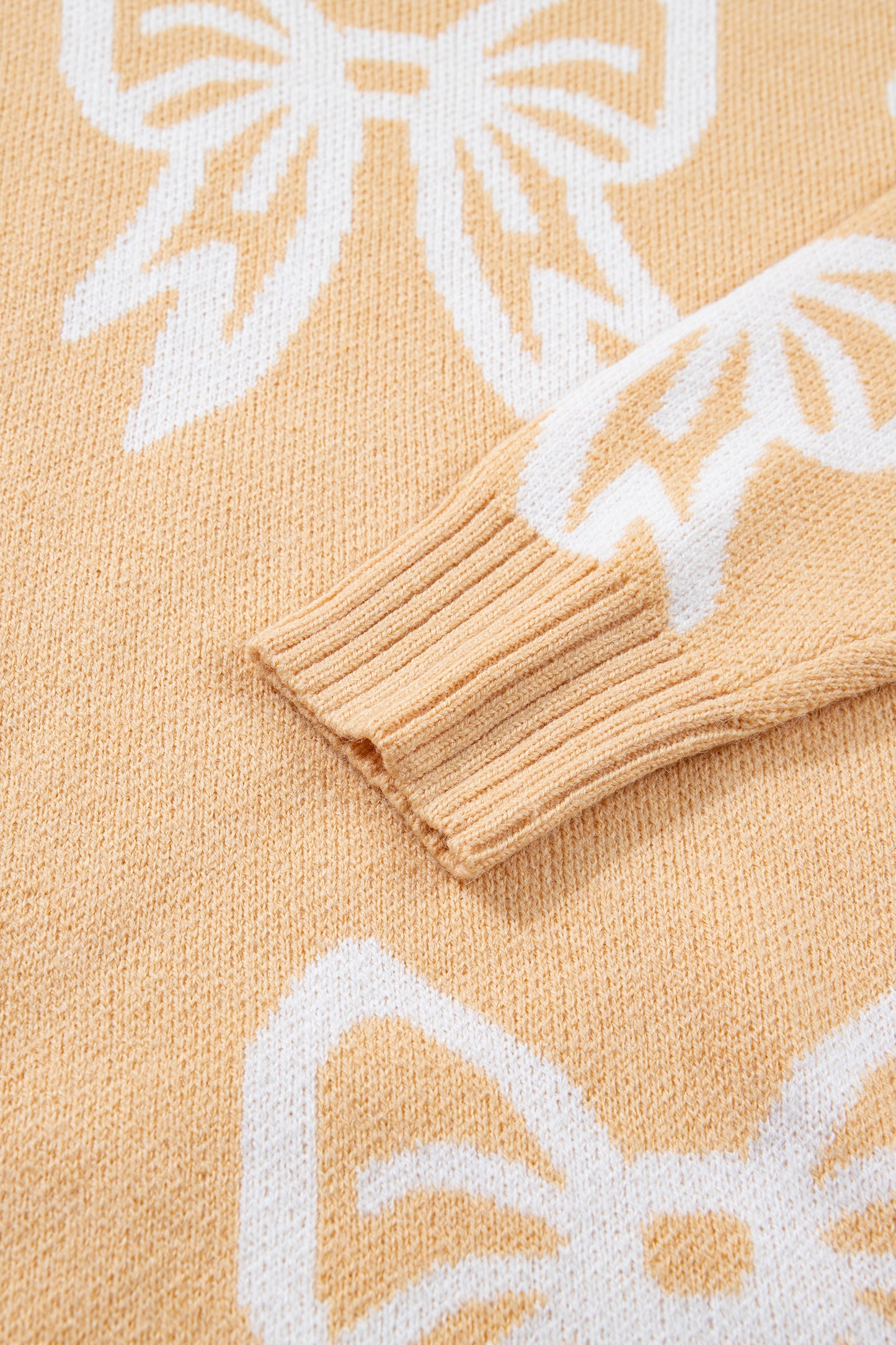 Golden Fleece Bow Pattern Drop Shoulder Loose Sweater